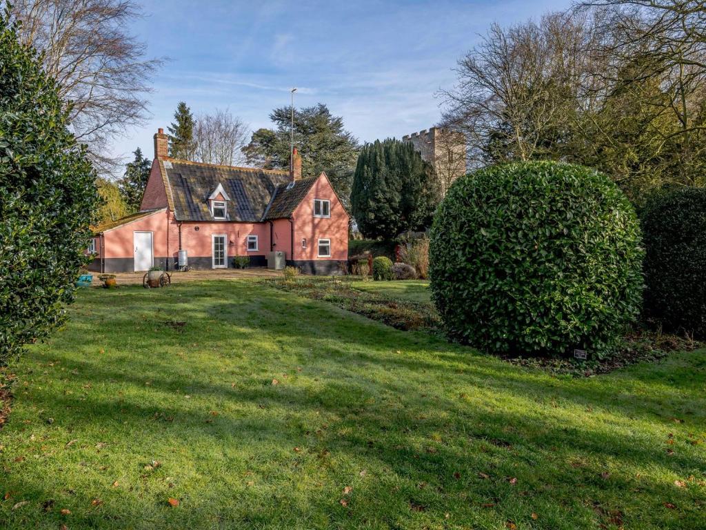 an old brick house with a large yard at The Lodge - Uk32622 in Swannington