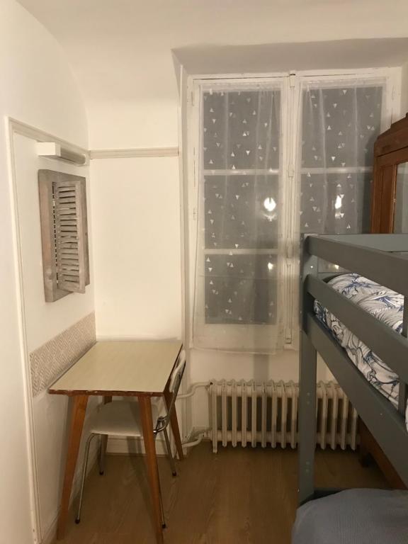 Posteľ alebo postele v izbe v ubytovaní La Residence 2