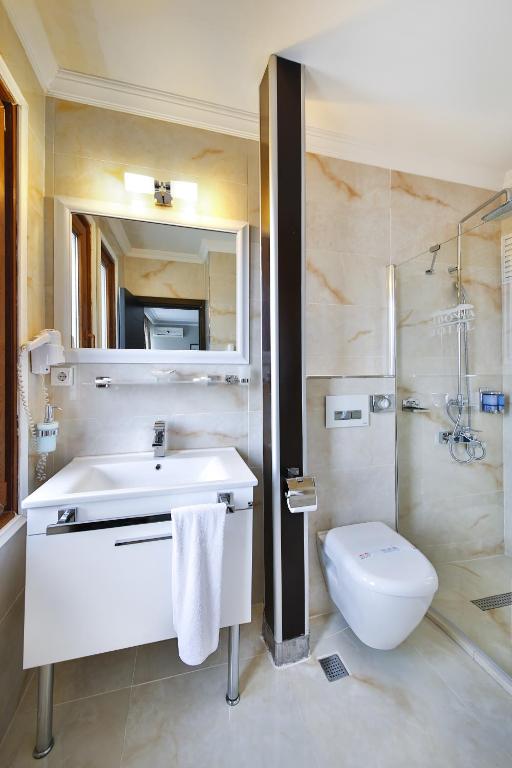 Koupelna v ubytování Sidonya Hotel