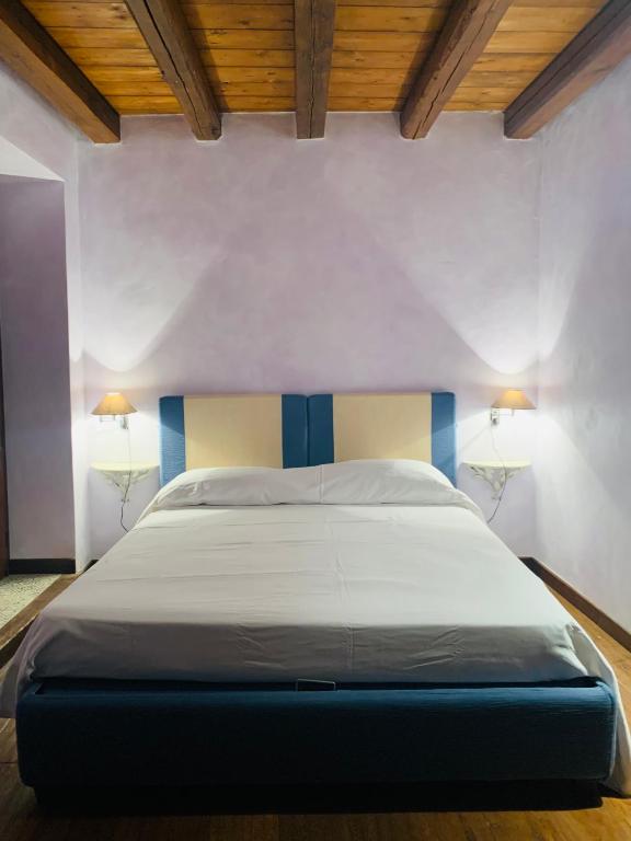 Posteľ alebo postele v izbe v ubytovaní WUNDERGARTEN Rural Spa House