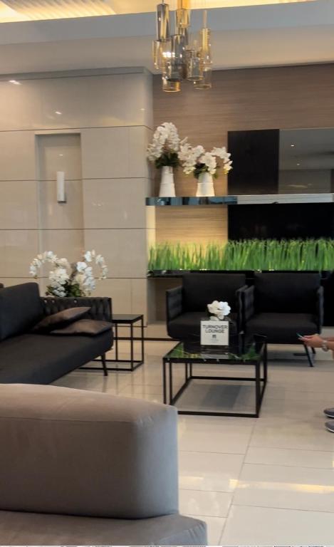 Predel za sedenje v nastanitvi Grass Residences tower 5