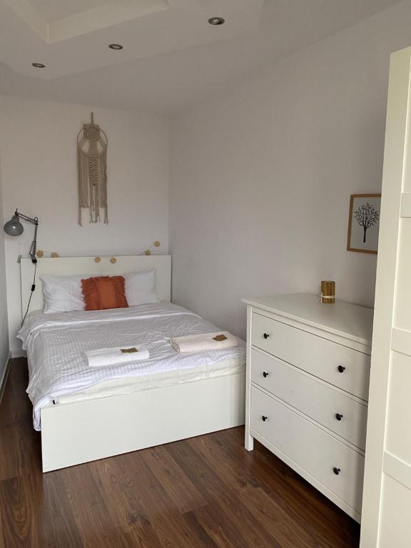 Posteľ alebo postele v izbe v ubytovaní Warsaw Concierge Franciszkańska Old Town