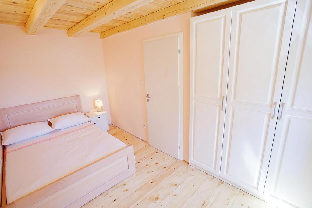 Postel nebo postele na pokoji v ubytování Villa Gordana