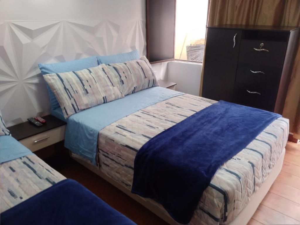Postel nebo postele na pokoji v ubytování Villa Suite Emanuel