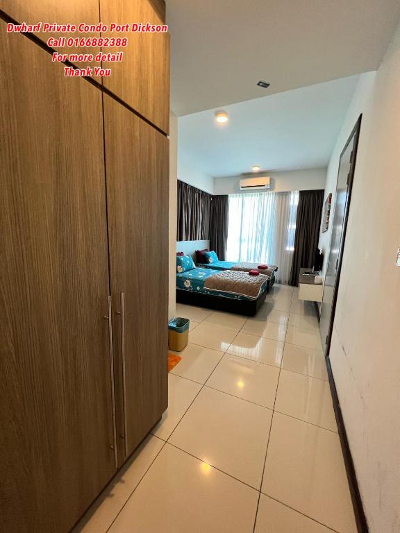 Postel nebo postele na pokoji v ubytování D Wharf Port Dickson Private Condo Waterfront