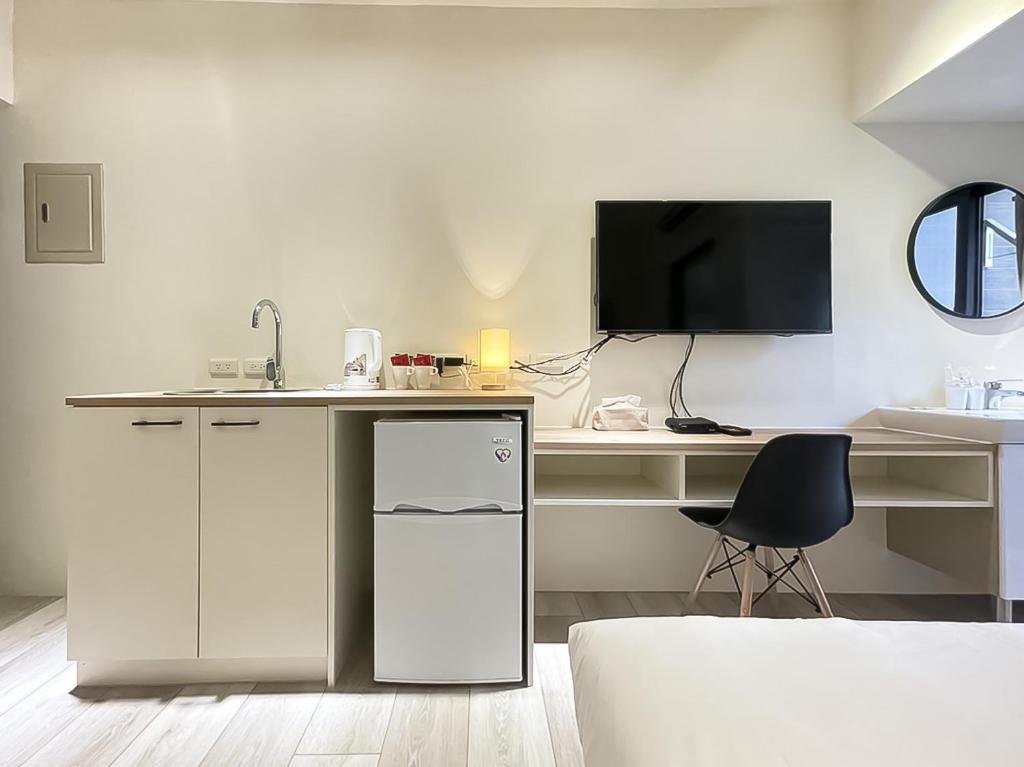 旅行家 Affetto Hostel電視和／或娛樂中心