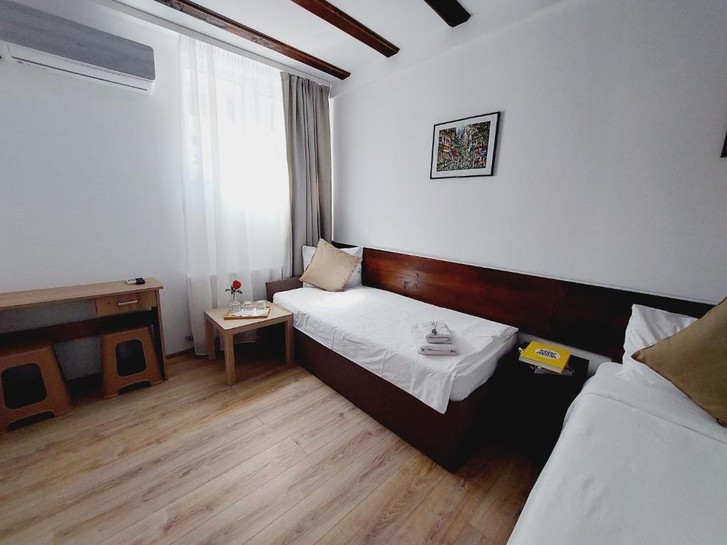 Postel nebo postele na pokoji v ubytování Confort INN