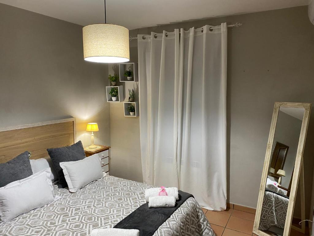 Postel nebo postele na pokoji v ubytování La Casa De Marta