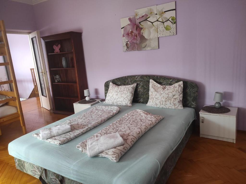 Postel nebo postele na pokoji v ubytování Mo relax vendégház