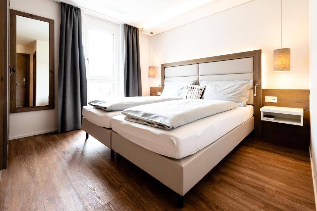 Postel nebo postele na pokoji v ubytování Hotel Rubus