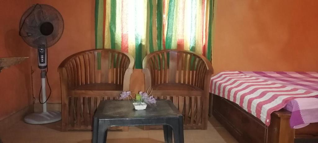 Postel nebo postele na pokoji v ubytování කැලෑව Jungle Eco Resort
