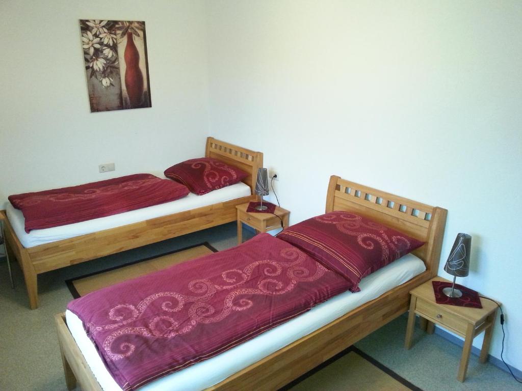 Postel nebo postele na pokoji v ubytování Ferienwohnung Taubertal Familie Arold
