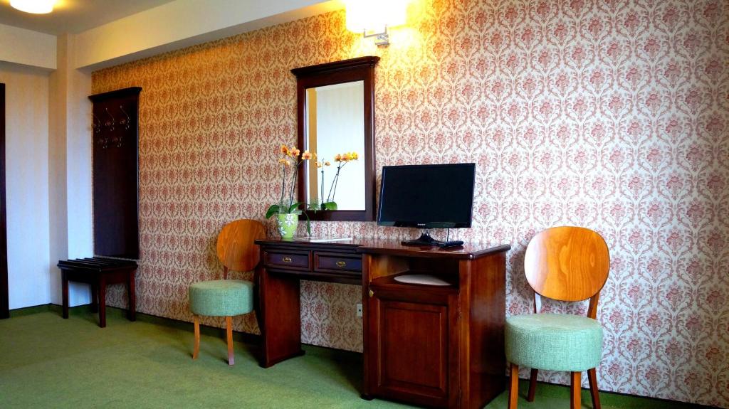 TV a/nebo společenská místnost v ubytování Hotel Residenz