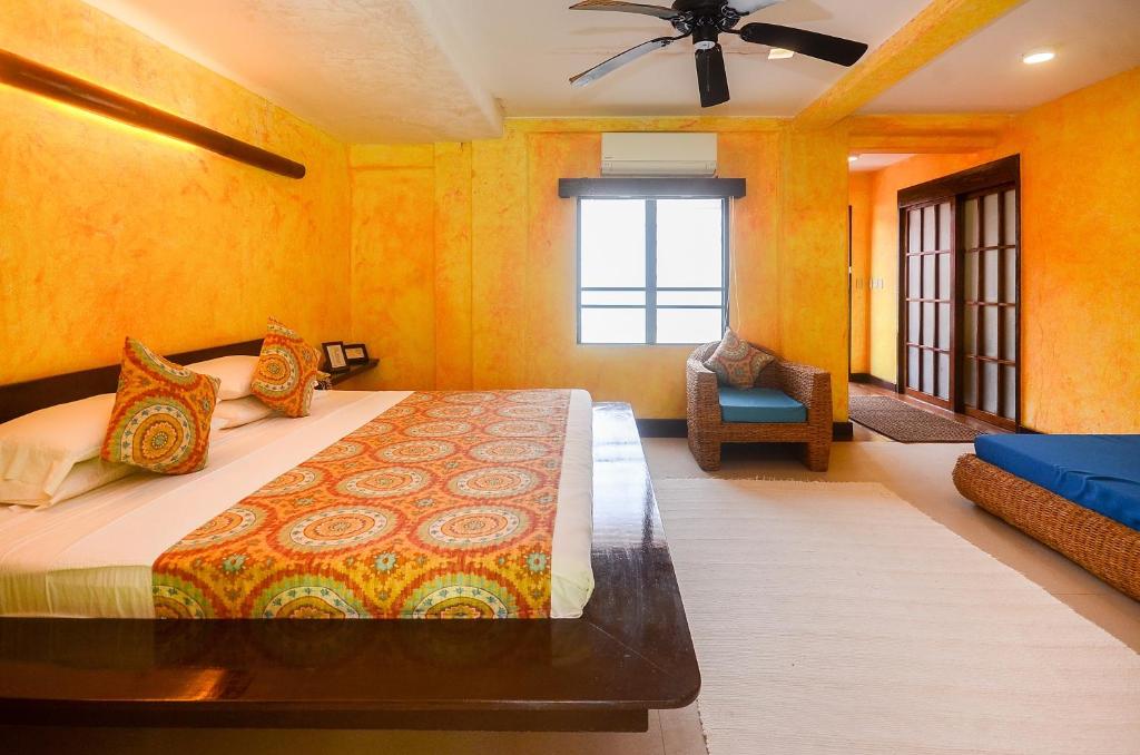 Postel nebo postele na pokoji v ubytování Signature Boracay Punta Rosa