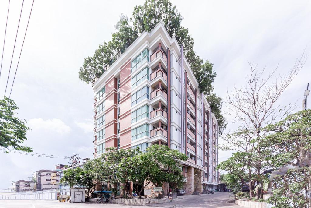 an architectural rendering of a tall building at Latin Garden Hotel in Bangkok