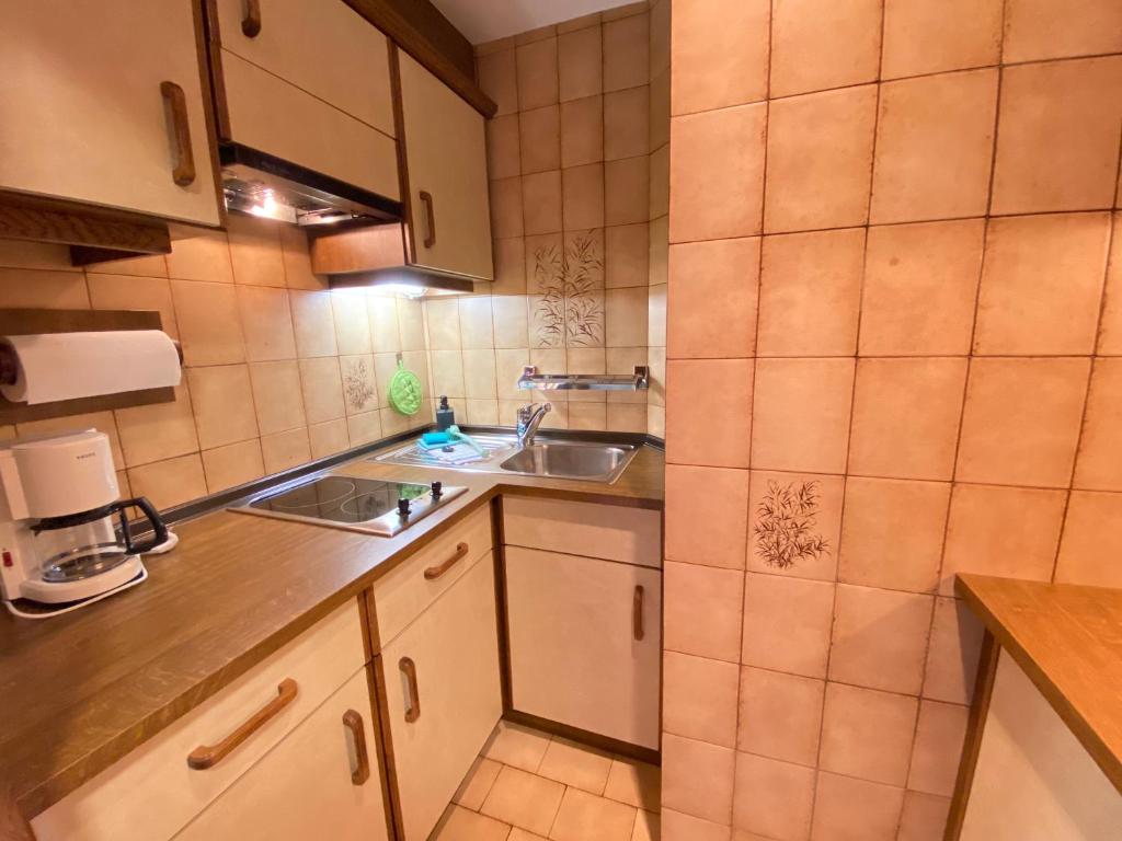A kitchen or kitchenette at Villa Erika