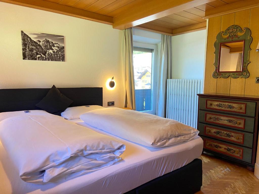 A bed or beds in a room at Villa Erika