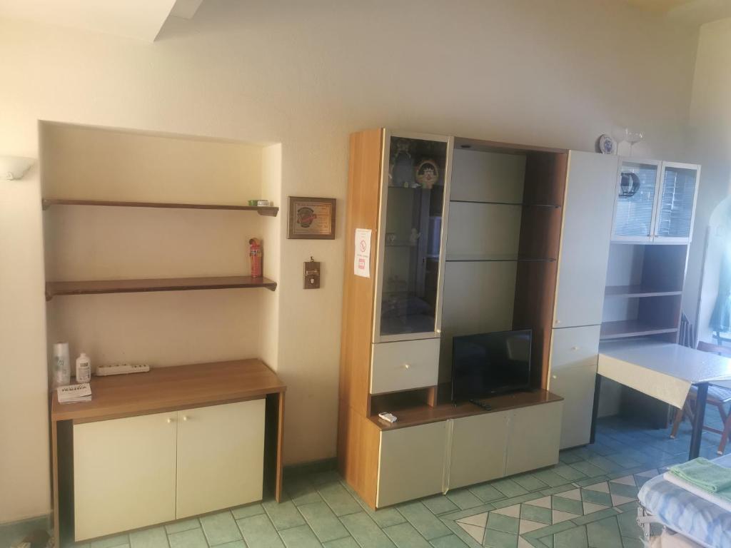 A bed or beds in a room at Monolocale Ischia Isola Verde