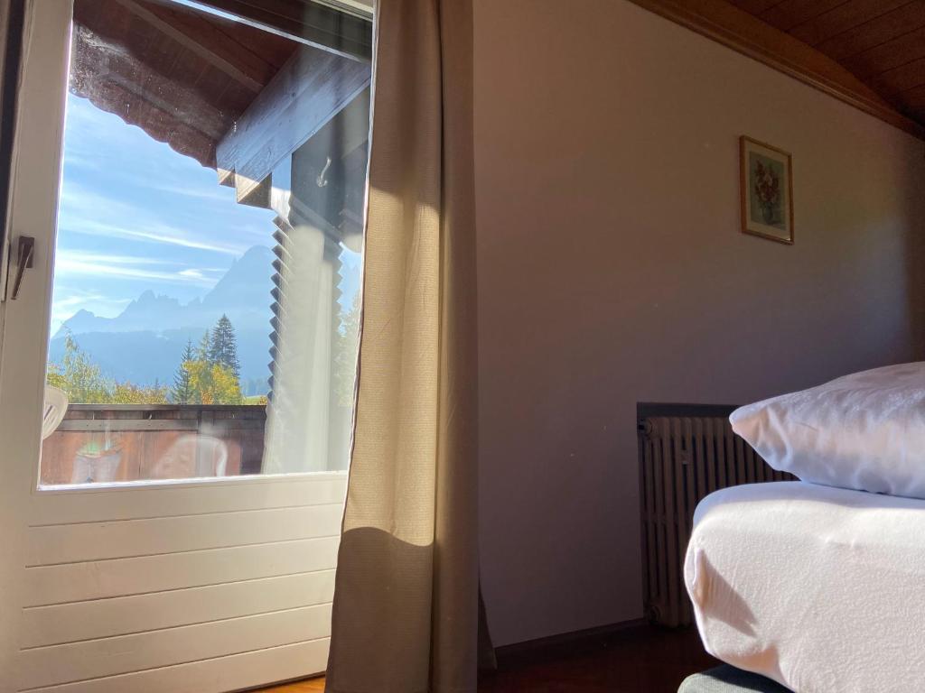 A bed or beds in a room at Villa Erika
