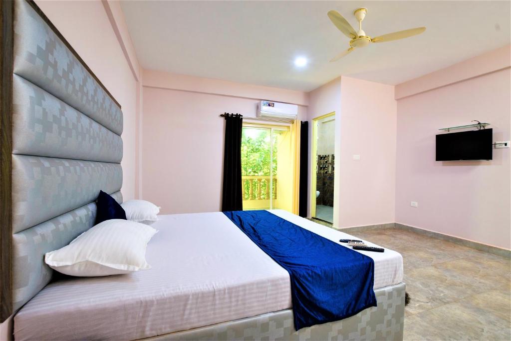 Postel nebo postele na pokoji v ubytování Casa Da Village Calangute Goa