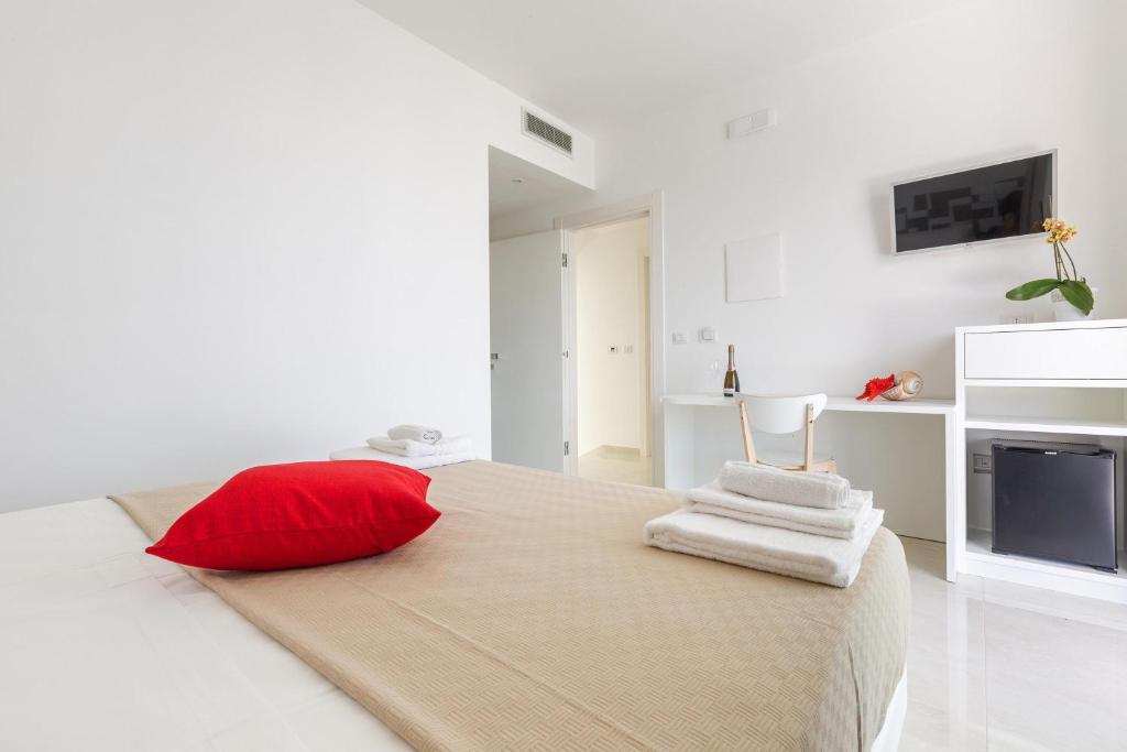 Postel nebo postele na pokoji v ubytování Stella del Mare Rooms