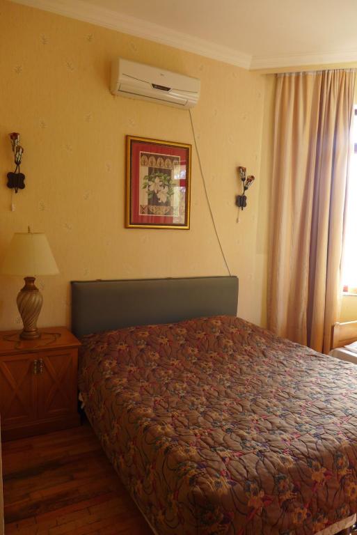 Postel nebo postele na pokoji v ubytování Guesthouse Belgrade
