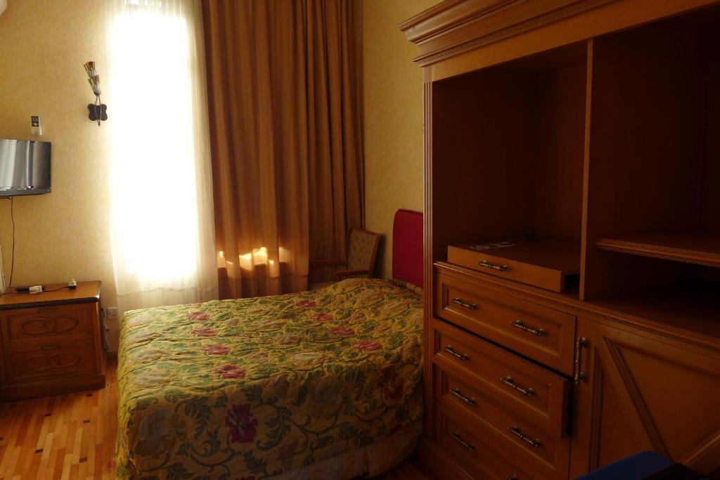 Postel nebo postele na pokoji v ubytování Guesthouse Belgrade