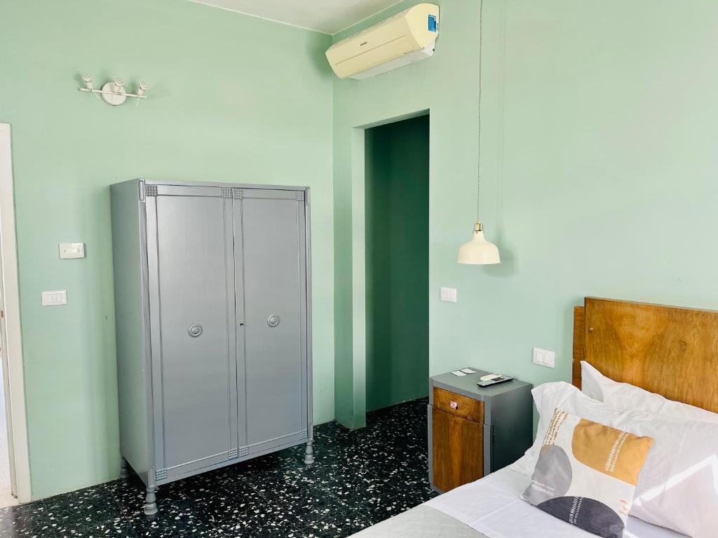 Postel nebo postele na pokoji v ubytování Ripari di Giobbe