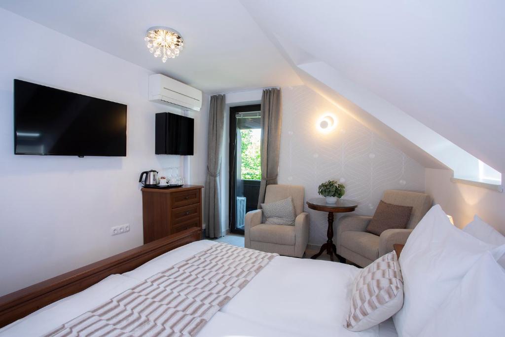 Postel nebo postele na pokoji v ubytování House Klasika - Adults Only