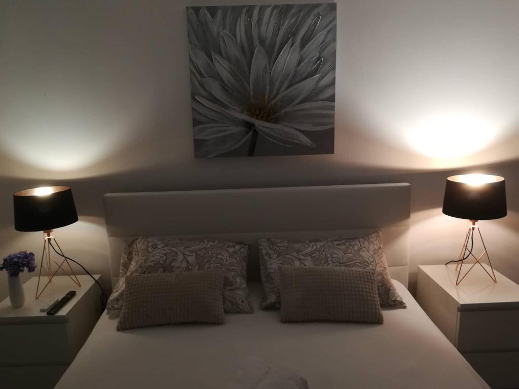 Postel nebo postele na pokoji v ubytování APARTMAN D&D***