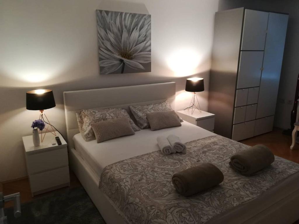 Postel nebo postele na pokoji v ubytování APARTMAN D&D***