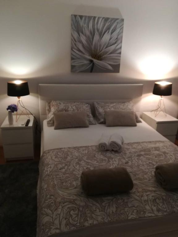 Postel nebo postele na pokoji v ubytování APARTMAN D&D***