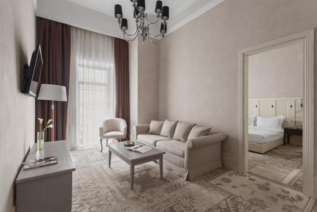 Postel nebo postele na pokoji v ubytování Ribas Duke Boutique Hotel