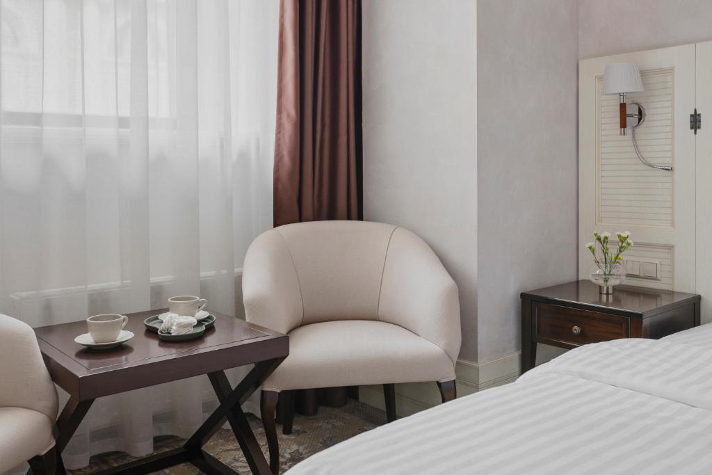 Postel nebo postele na pokoji v ubytování Ribas Duke Boutique Hotel
