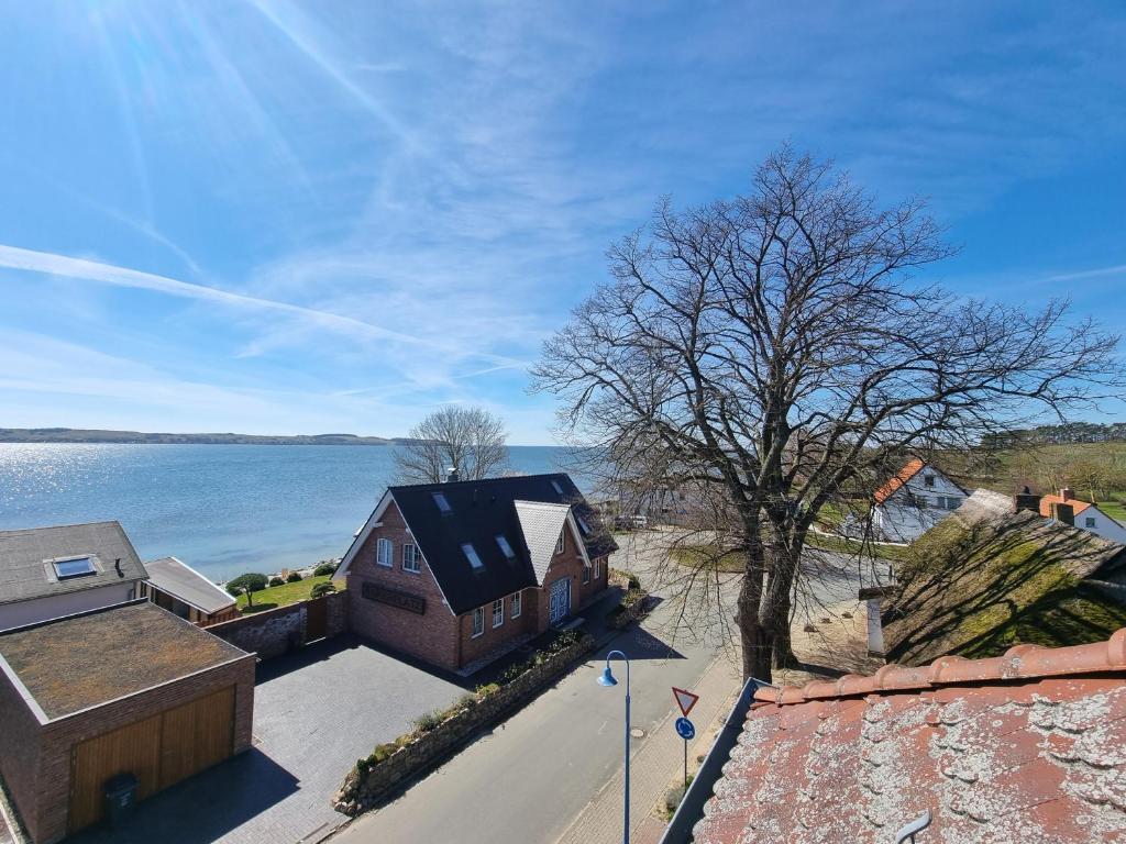 an aerial view of a house next to the water at Visum Mare in Alt Reddevitz