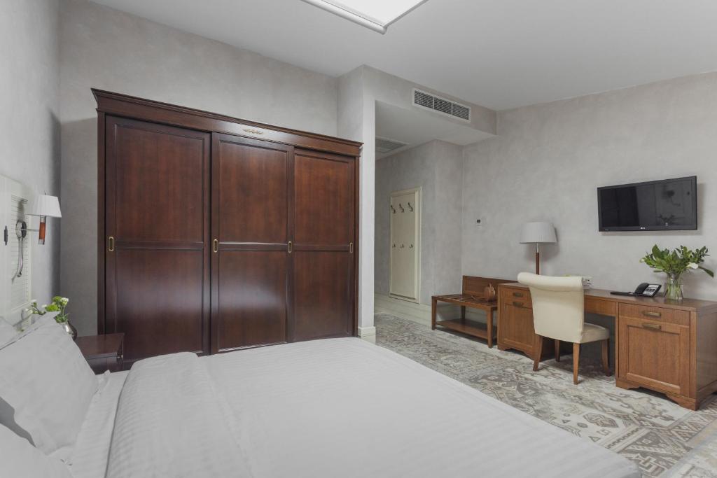 TV a/nebo společenská místnost v ubytování Ribas Duke Boutique Hotel
