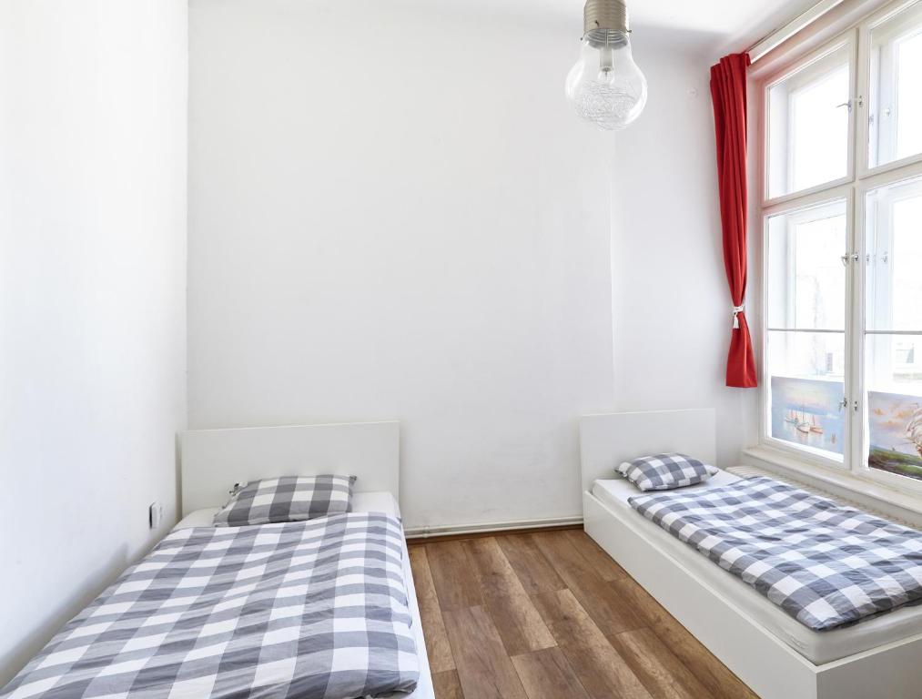Postel nebo postele na pokoji v ubytování Lovecroatia Zagreb - 'Pax nest'