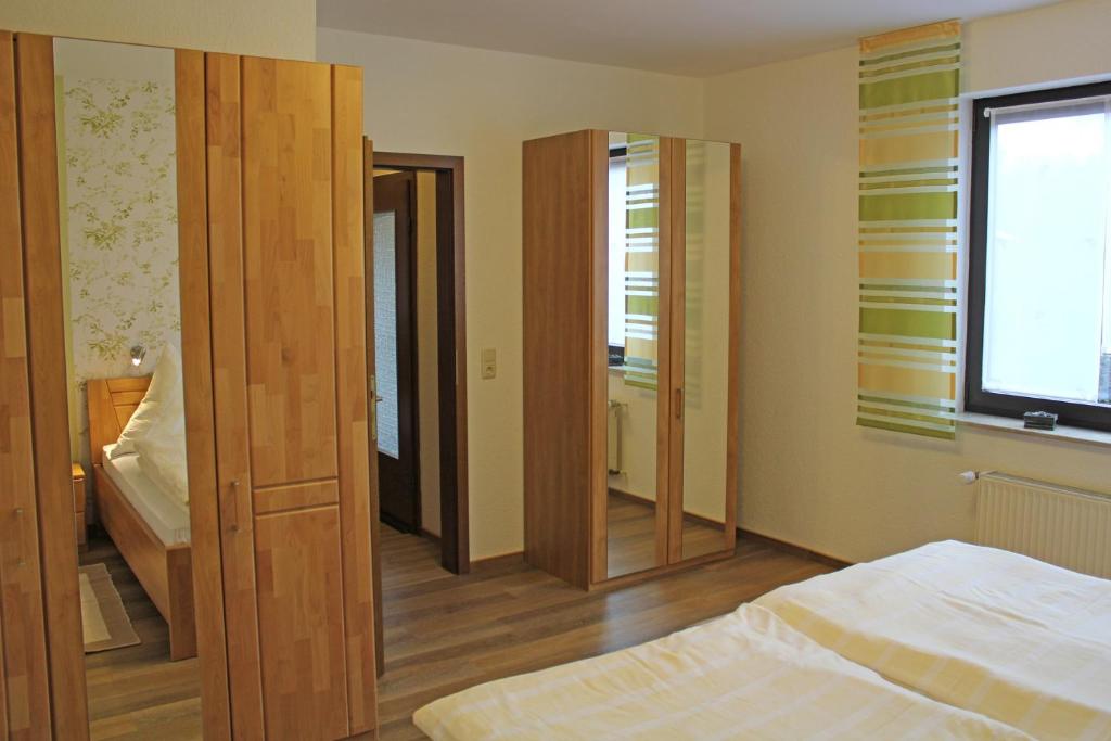 Postel nebo postele na pokoji v ubytování Haus Hesseberg