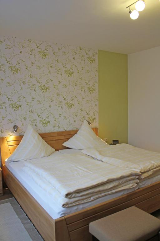 Postel nebo postele na pokoji v ubytování Haus Hesseberg
