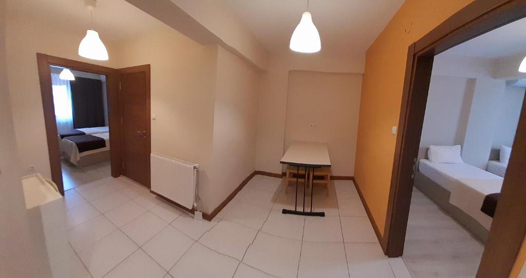 Postel nebo postele na pokoji v ubytování Moda Hotel
