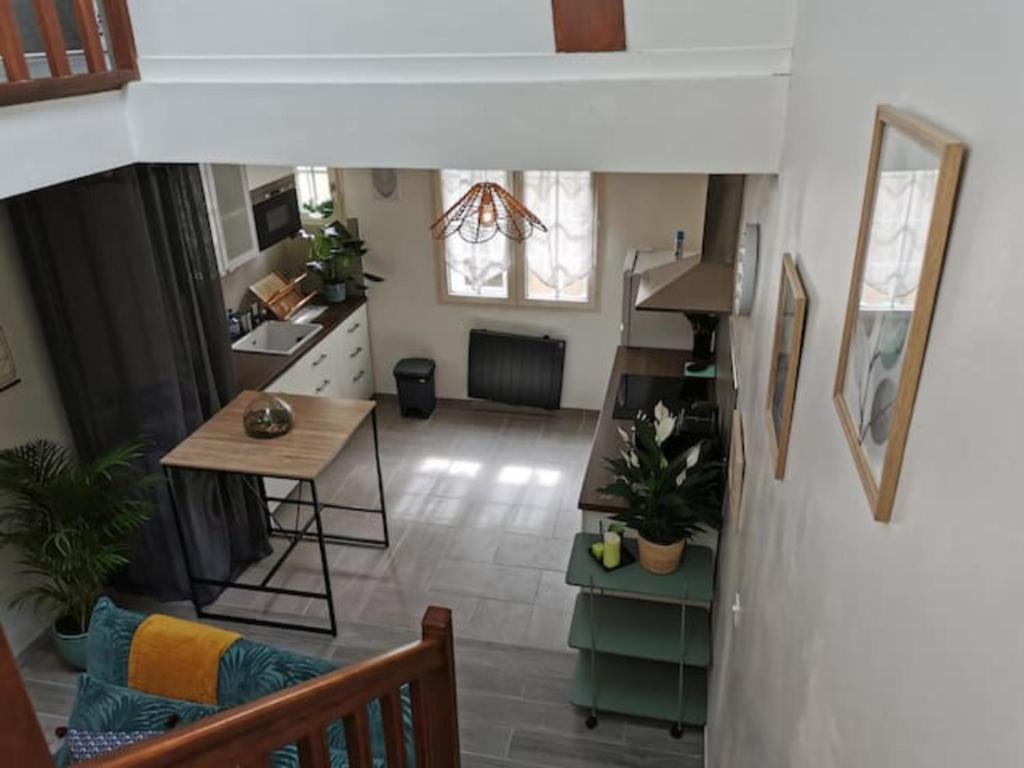 an aerial view of a kitchen and a living room at Les bords de Seine in Vernon