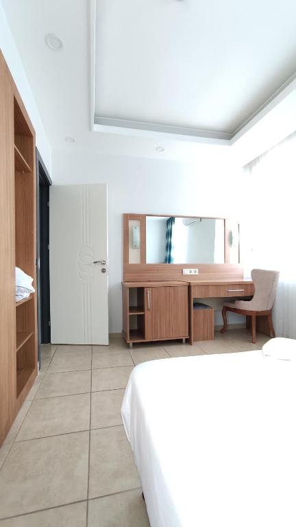 Postel nebo postele na pokoji v ubytování Wonder Life Hotel