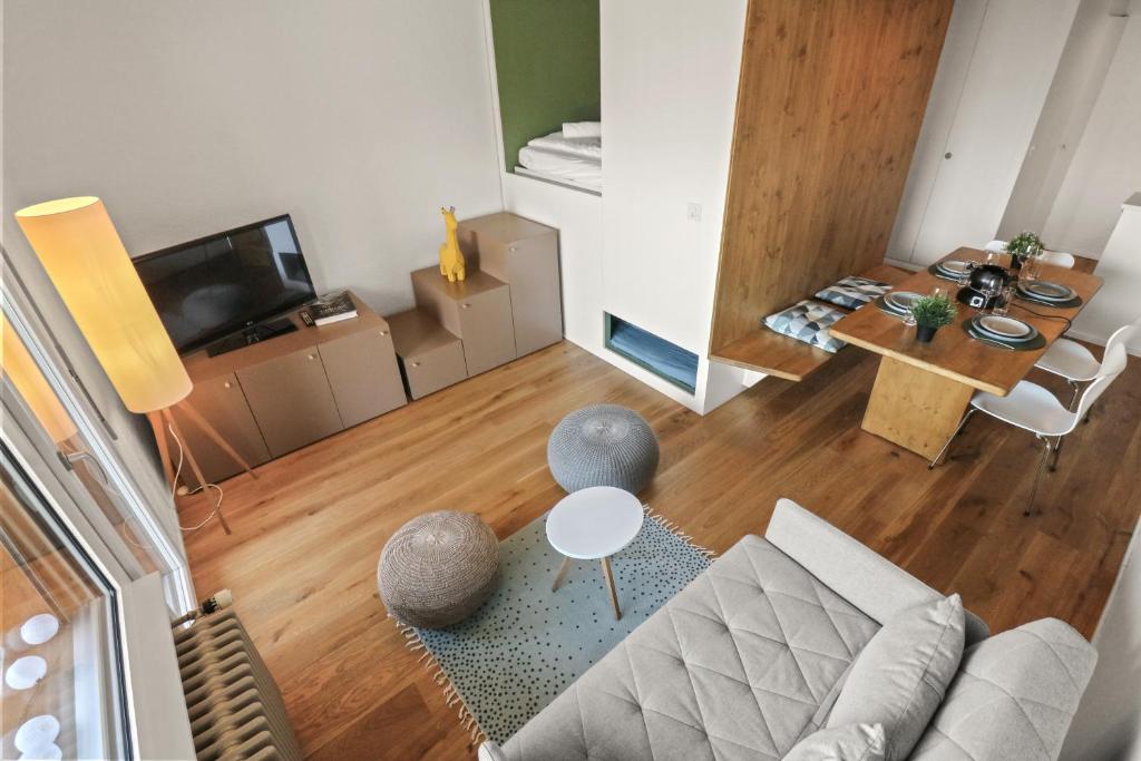TV a/nebo společenská místnost v ubytování Superbe appartement avec piscine