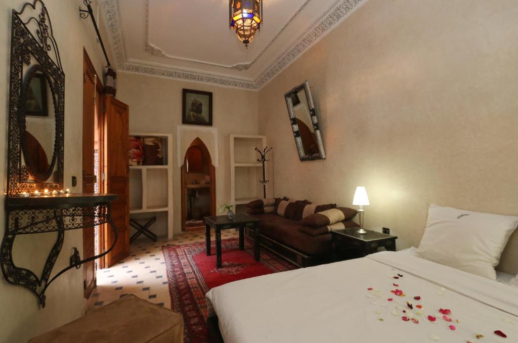 Postel nebo postele na pokoji v ubytování Riad Maissoun
