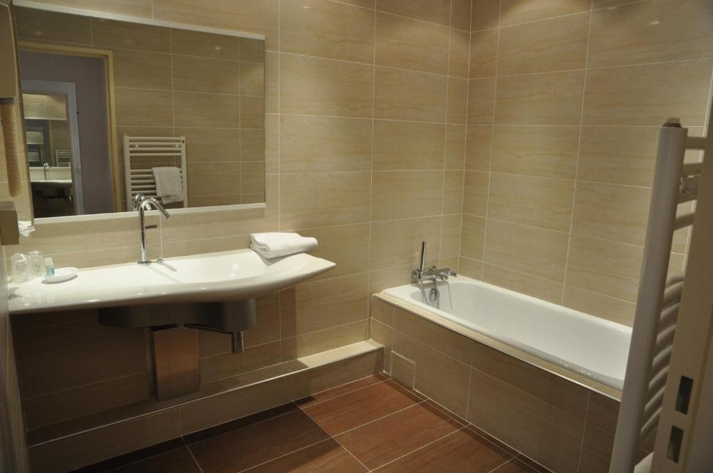 Koupelna v ubytování Hotel Poretta