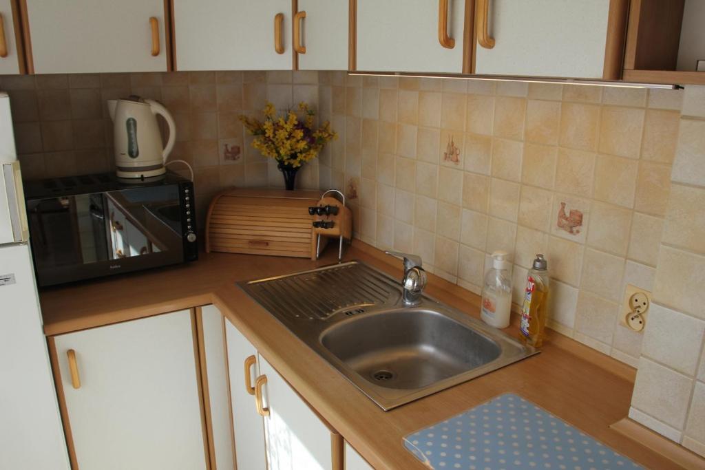 Kuchyňa alebo kuchynka v ubytovaní Przytulny, spokojny, wyposażony apartament