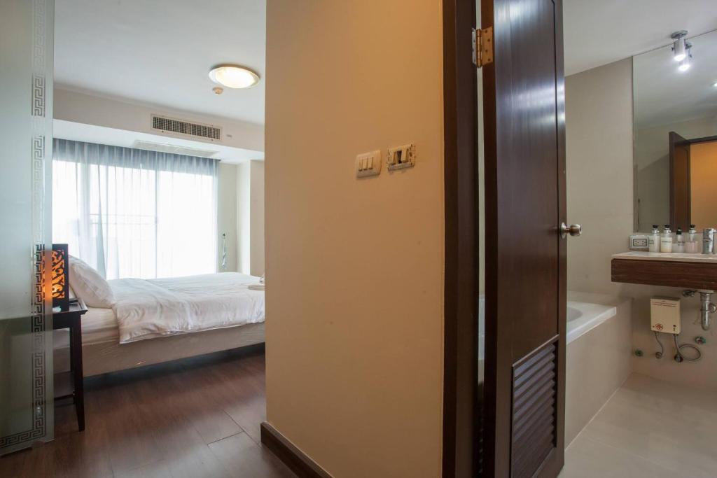 Postel nebo postele na pokoji v ubytování 4D-Lovely 25 Bedrooms Bkk Downtownbtsmrtboat