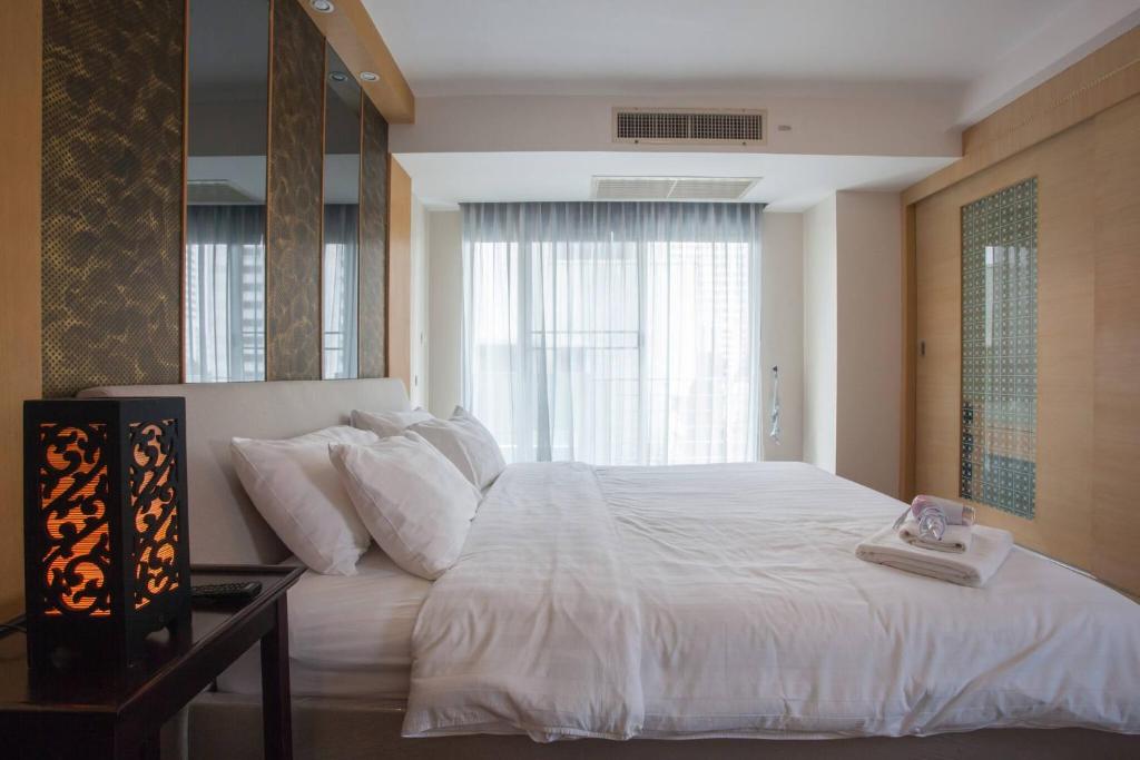 Postel nebo postele na pokoji v ubytování 4D-Lovely 25 Bedrooms Bkk Downtownbtsmrtboat