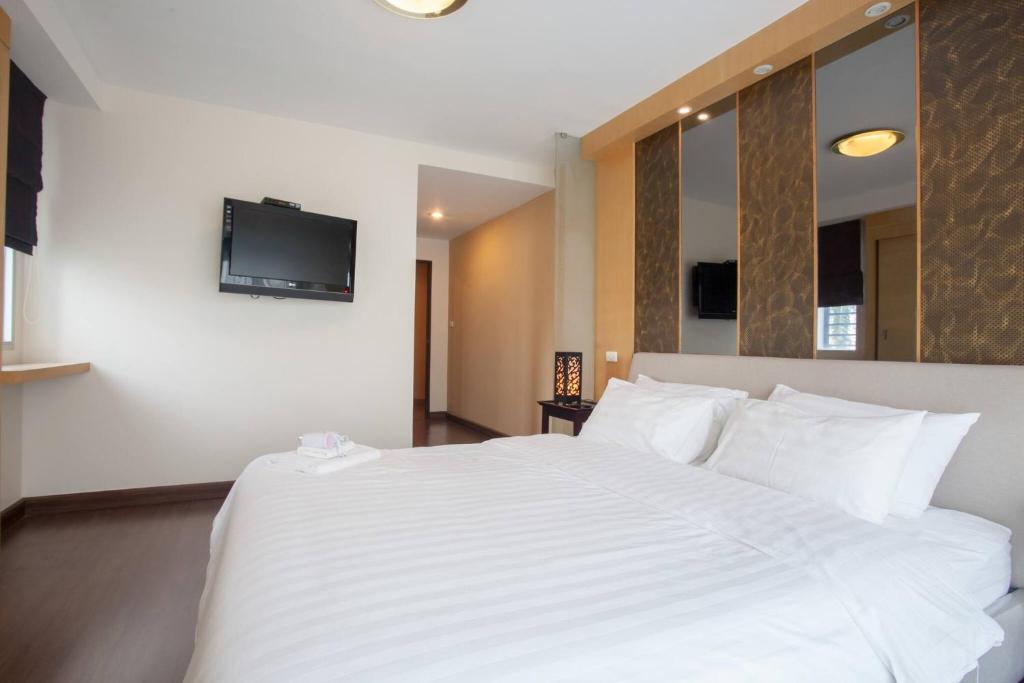 Postel nebo postele na pokoji v ubytování 4D-Lovely 25 Bedrooms Bkk Downtownbtsmrtboat
