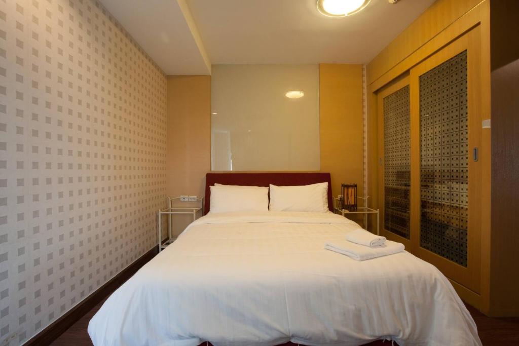 Postel nebo postele na pokoji v ubytování 4D-Lovely 25 Bedrooms Bkk Downtownbtsmrtboat